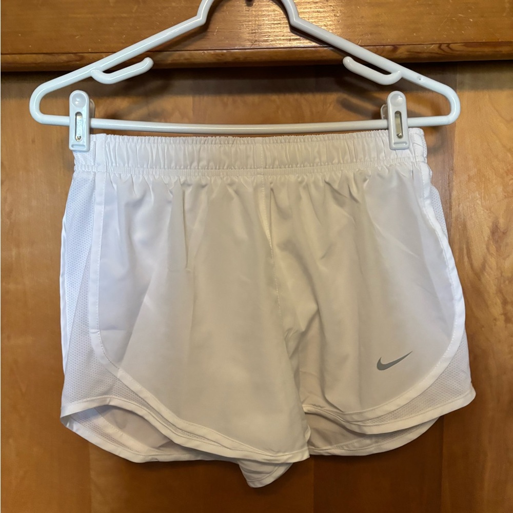 Nike White Athletic Shorts with Elastic Waistband and Breathable Material